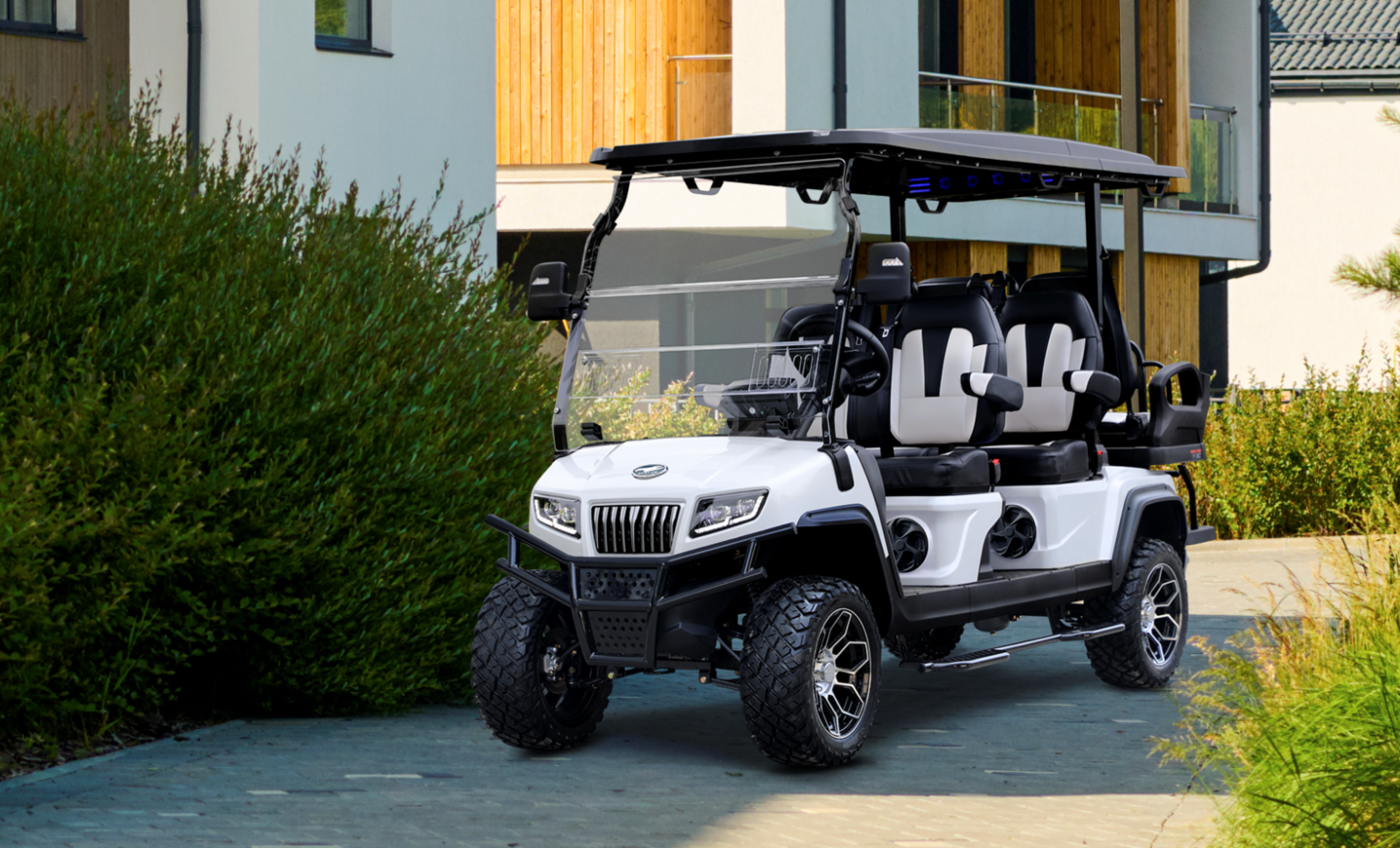 HDK Maverick all-terrain electric cart on rough outdoor terrain